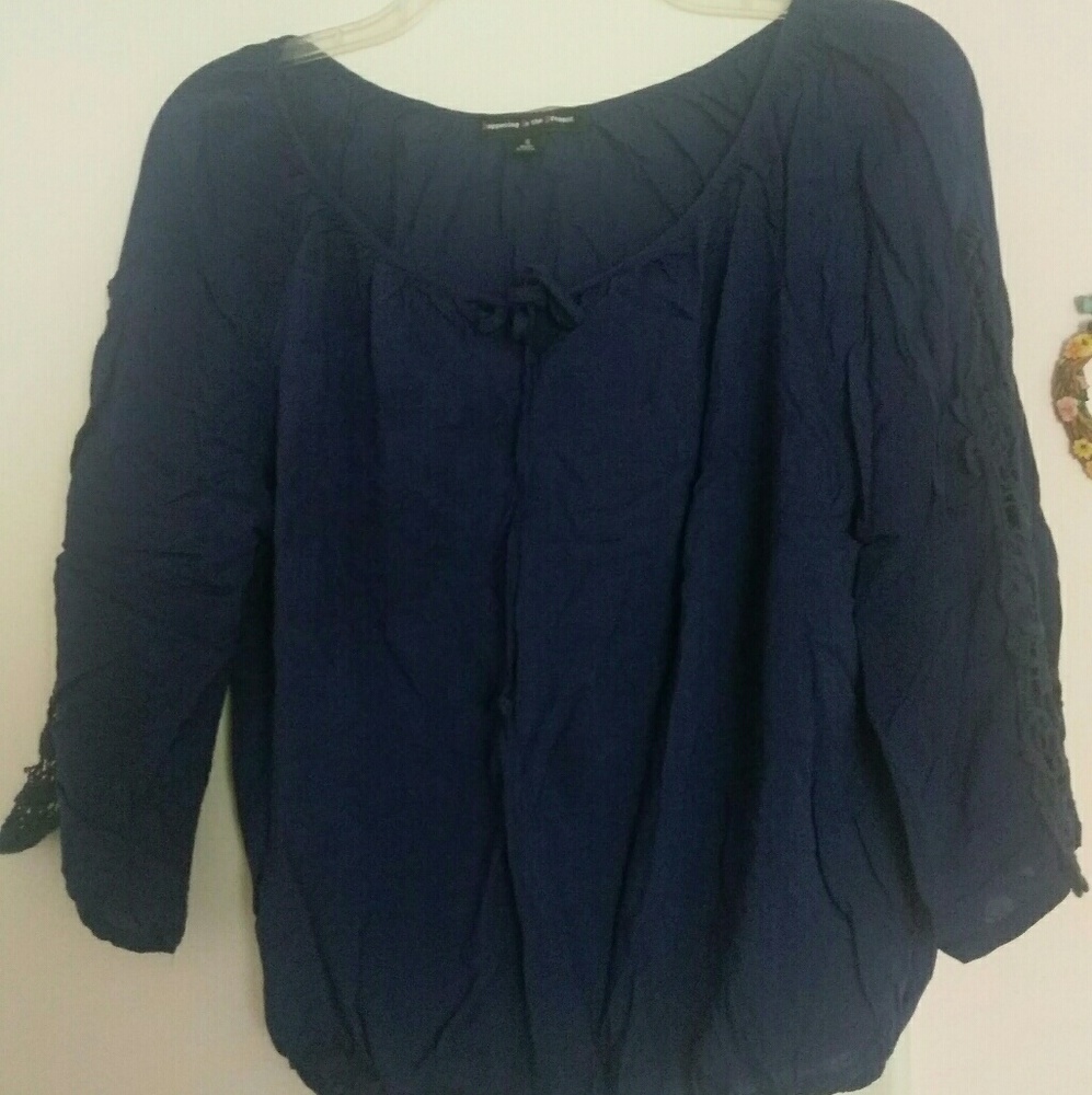 Happening in the present small blue top